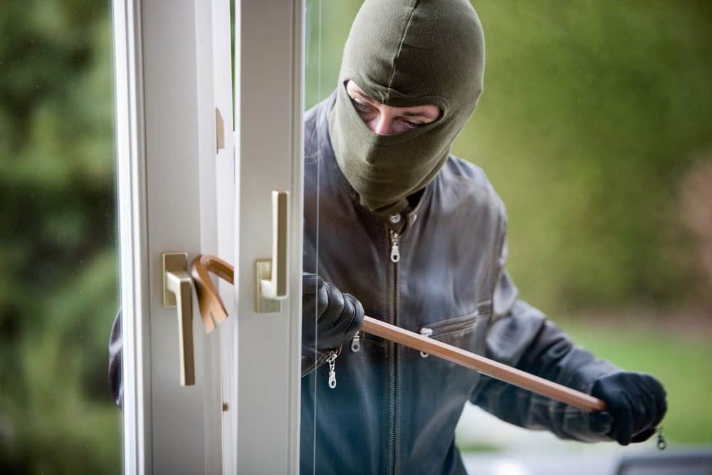 Intruder forcing a window
